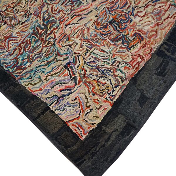Close-up corner view of the colorful abstract rug pattern by rugs on net. By rugs on net