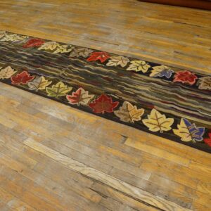 A runner rug with colorful autumn leaves border on a dark, wavy background, by Rugs On Net
