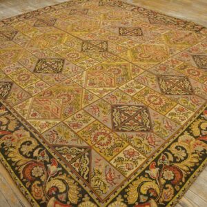 A close-up view of the intricate diamond pattern on the antique tapestry rug by Rugs On Net. by Rugs On Net