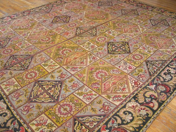 Close-up of a colorful, patchwork-style rug with geometric and floral motifs, by rugs on net