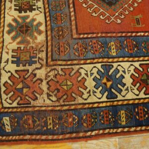 Close-up of the border of an antique Caucasian rug by Rugs On Net. by Rugs On Net