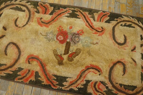 Close-up of a vintage floral rug with scrolling borders by rugs on net