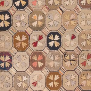 Colorful geometric pattern on fabric Antique American Hooked Rug