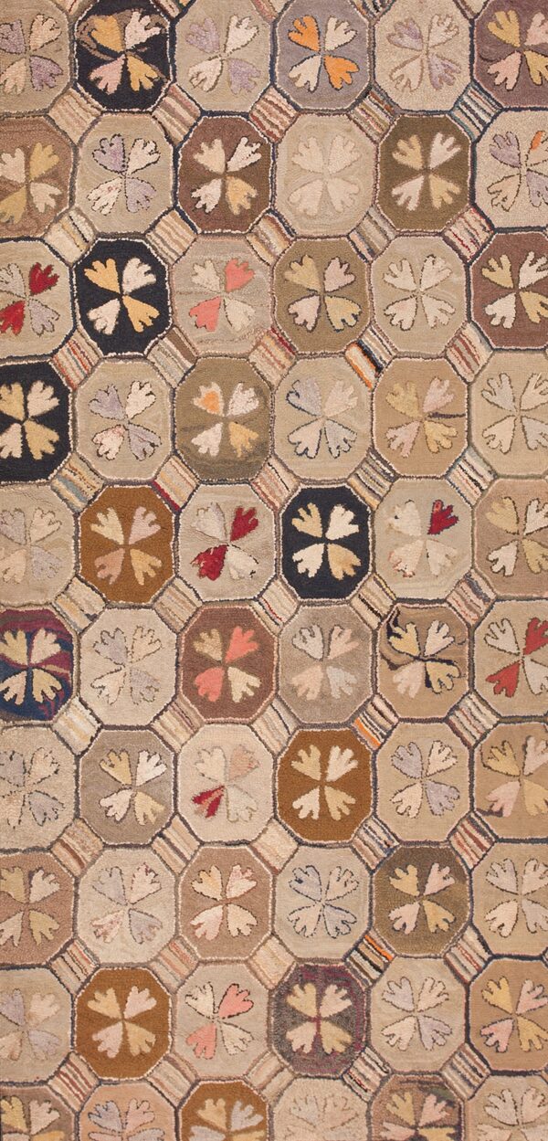 Colorful geometric pattern on fabric antique american hooked rug