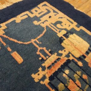 Blue carpet with floral design.