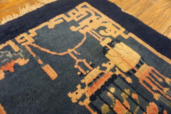 Blue carpet with floral design.