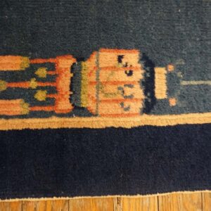 Blue carpet with intricate patterns.