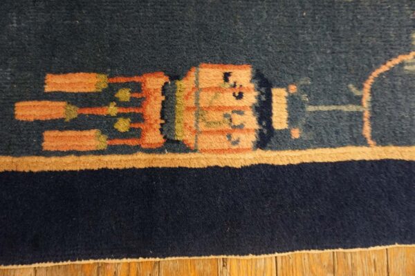 Blue carpet with intricate patterns.