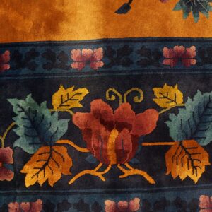 Floral design on dark background carpet