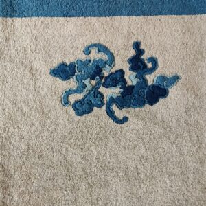 Blue floral patterns on beige background