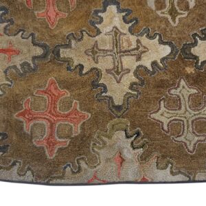 Close-up of a brown hooked rug featuring stylized cross motifs within undulating borders by Rugs On Net