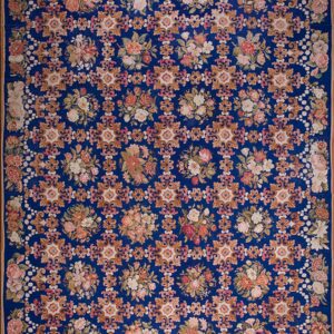Floral pattern on blue background. Antique European Needlepoint Rug 13'6" x 20'6"