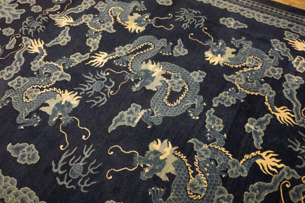 Dark blue dragon-patterned rug corner