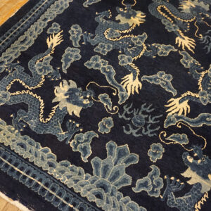 Blue dragon pattern on dark background