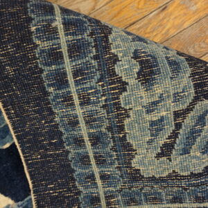 Dark blue dragon-patterned antique rug