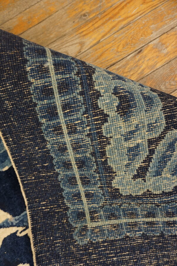Dark blue dragon-patterned antique rug