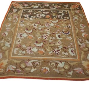 A brown Aubusson style rug with floral motifs in muted pastels, by Rugs On Net. by Rugs On Net