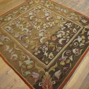 Close-up of a floral Aubusson-style rug with brown and gold tones, by Rugs On Net