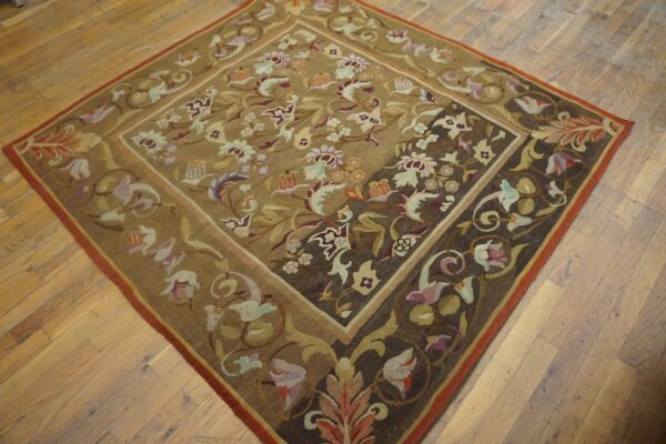 Close-up of a floral aubusson-style rug with brown and gold tones, by rugs on net