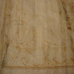 Faded floral antique carpet design.