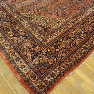 Intricate patterned antique Persian rug