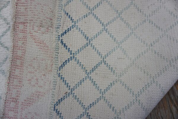 Textured fabric with geometric patterns.