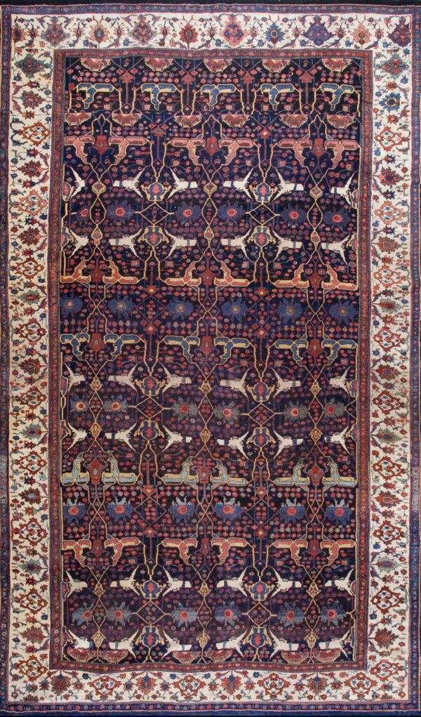 Antique oversized late 19th century persian bidjar with deep navy field and salmon pink and light blue accents rug by rugs on net