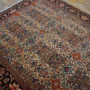 Close-up view of a traditional floral patterned rug with cream, orange, and blue accents by Rugs On Net