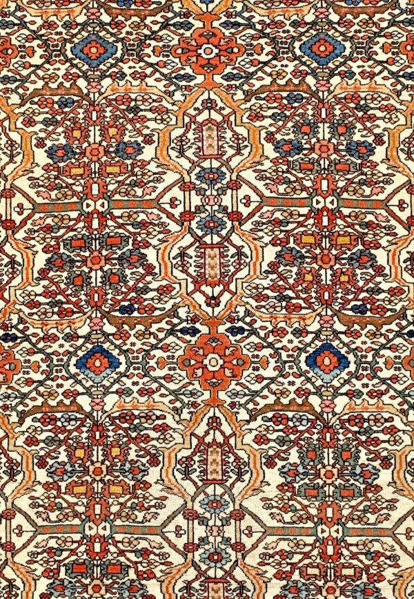 Close-up of a traditional rug pattern featuring intricate floral and geometric motifs in red, blue, and earth tones on a cream background, by rugs on net. By rugs on net