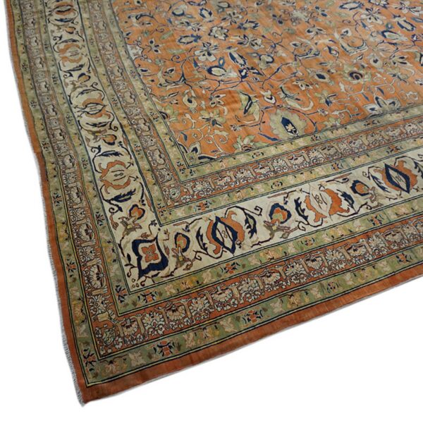 Ornate orange persian tabriz rug
