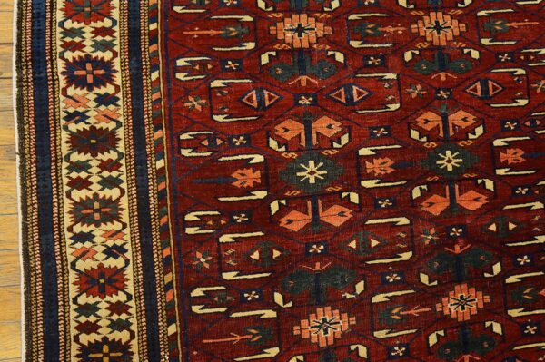 Colorful traditional caucasian rug design