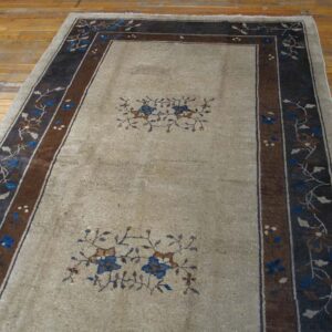 Decorative rug with floral patterns.