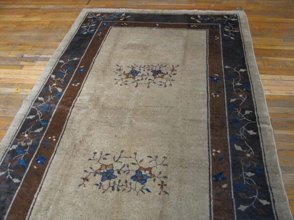 Decorative rug with floral patterns.