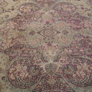 Intricate floral design on ivory background.