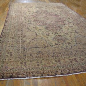 Intricate floral patterned antique rug