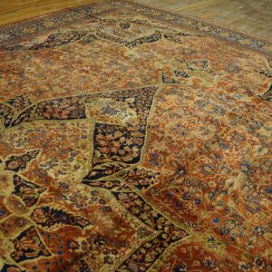 Intricate patterned antique Persian rug