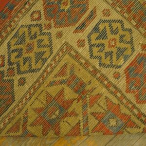Close-up of the corner weave and geometric patterns of the Antique Kilim Rug by Rugs On Net. by Rugs On Net