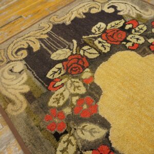 Close-up of a floral rug with red roses and gold accents on a dark background by Rugs On Net. by Rugs On Net