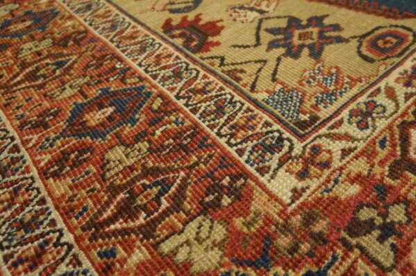 Close-up of the detailed border weaving on a traditional rug by rugs on net. By rugs on net