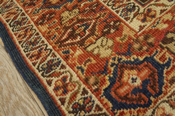 Close-up of the intricate border pattern on the persian rug by rugs on net. By rugs on net