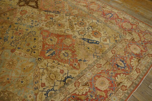 Close-up view of the intricate field and border of the antique persian rug by rugs on net. By rugs on net
