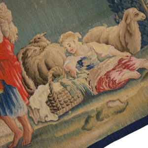 Detail of a pastoral tapestry showing figures and sheep by Rugs On Net