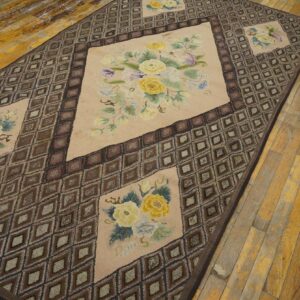 A floral medallion rug with yellow roses on a beige field and a brown diamond border, by Rugs On Net. by Rugs On Net