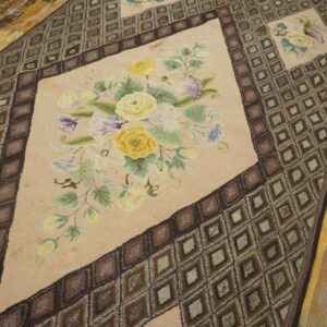 Close-up of a floral rag rug with yellow roses and a diamond border by Rugs On Net