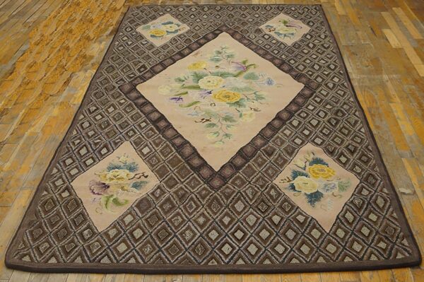 A rectangular rug featuring a central diamond medallion with yellow roses on a beige field, surrounded by a brown geometric border, by rugs on net. By rugs on net