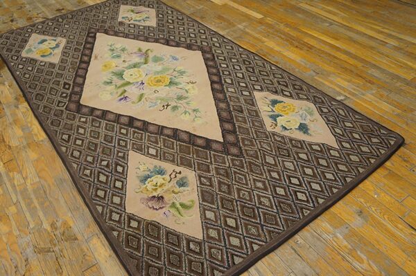Rectangular rug featuring a geometric diamond border and central floral medallions in muted tones, by rugs on net