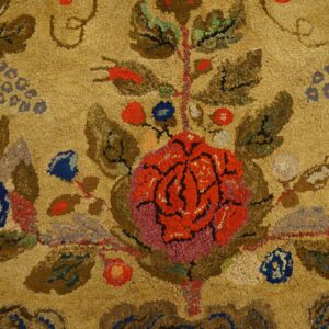 Close-up texture of the Antique Hooked Rug, Floral Pattern, showing the central red rose design and looped wool texture by Rugs On Net