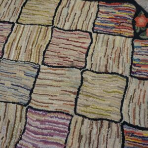 Close-up of a colorful, patchwork hooked rug with abstract squares by Rugs On Net. by Rugs On Net