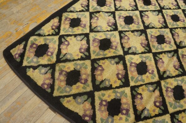 Close-up of a floral checkerboard rug pattern with black borders by rugs on net