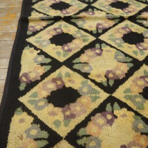 Close-up of a yellow and black floral diamond pattern rug by Rugs On Net